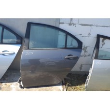 двері задні ліві 203 nissan p12